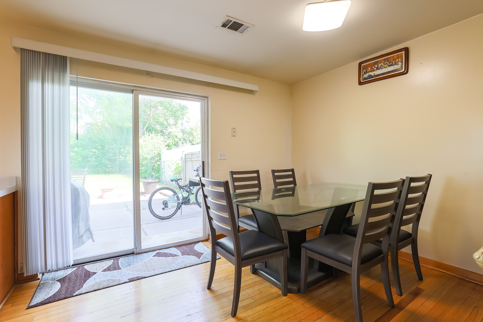 9461 Dee Road Des Plaines, IL 60016 - Photo 16 of 26 a view of a dining room with furniture and window