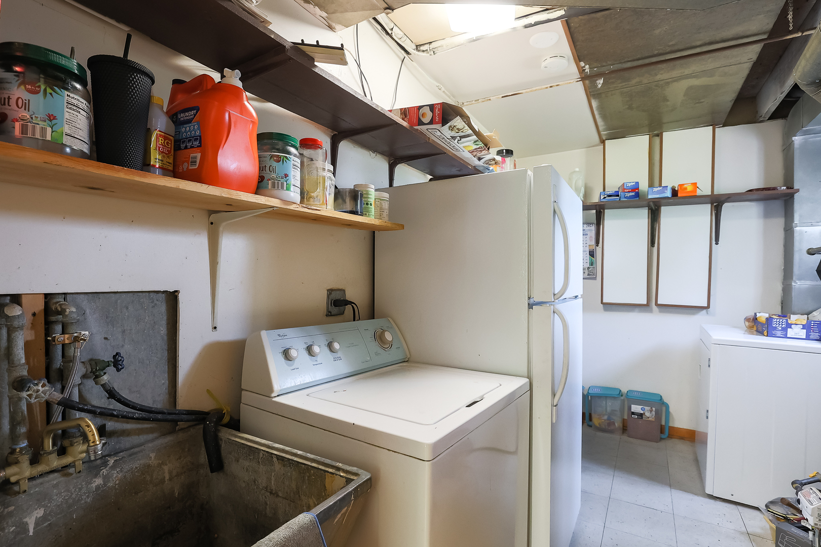 9461 Dee Road Des Plaines, IL 60016 - Photo 22 of 26 a utility room with dryer and washer