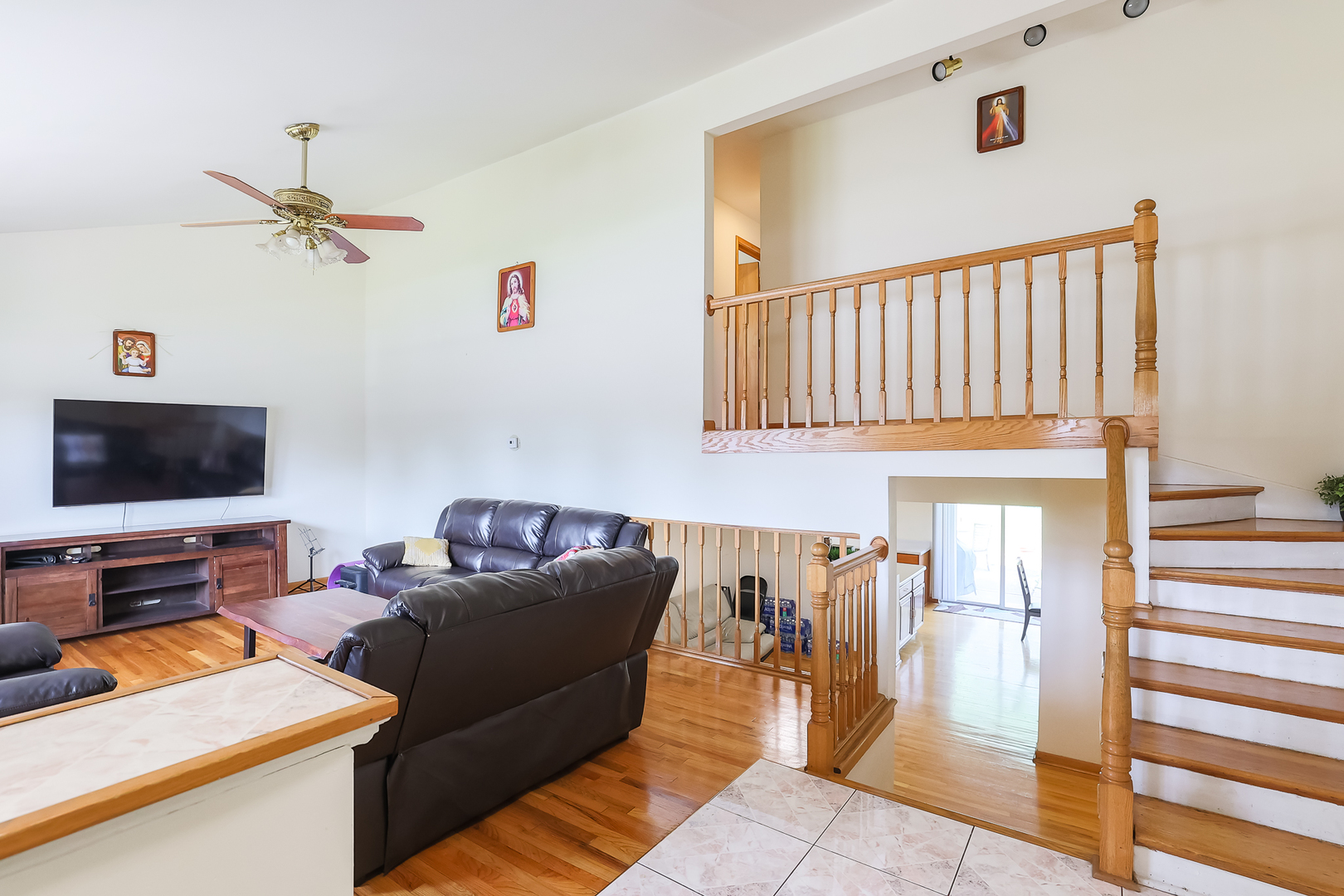 9461 Dee Road Des Plaines, IL 60016 - Photo 4 of 26 a living room with furniture and a flat screen tv