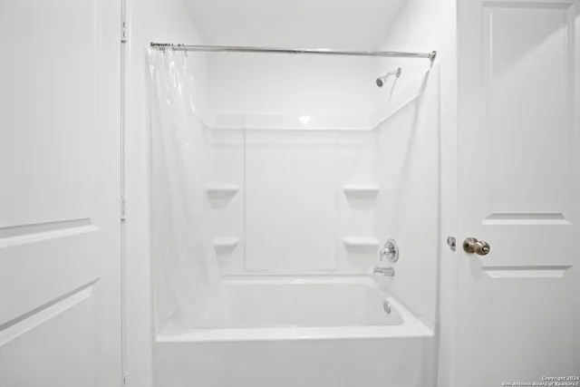 a bathroom with a bathtub