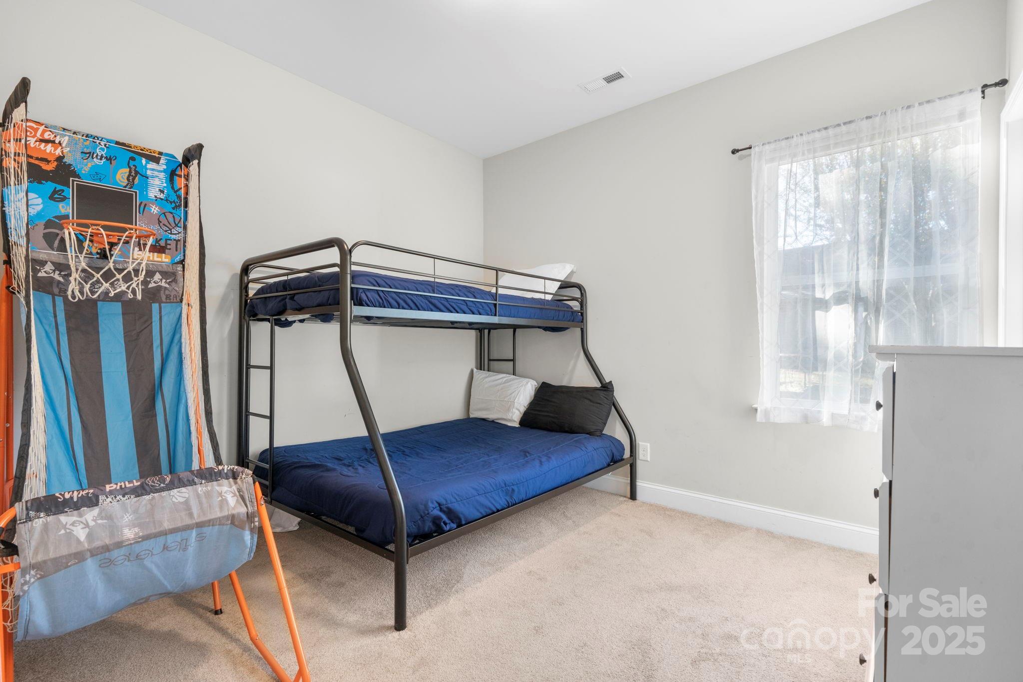402 2nd Street Southwest Hickory, NC 28602 - Photo 19 of 24 a living room with furniture and a window