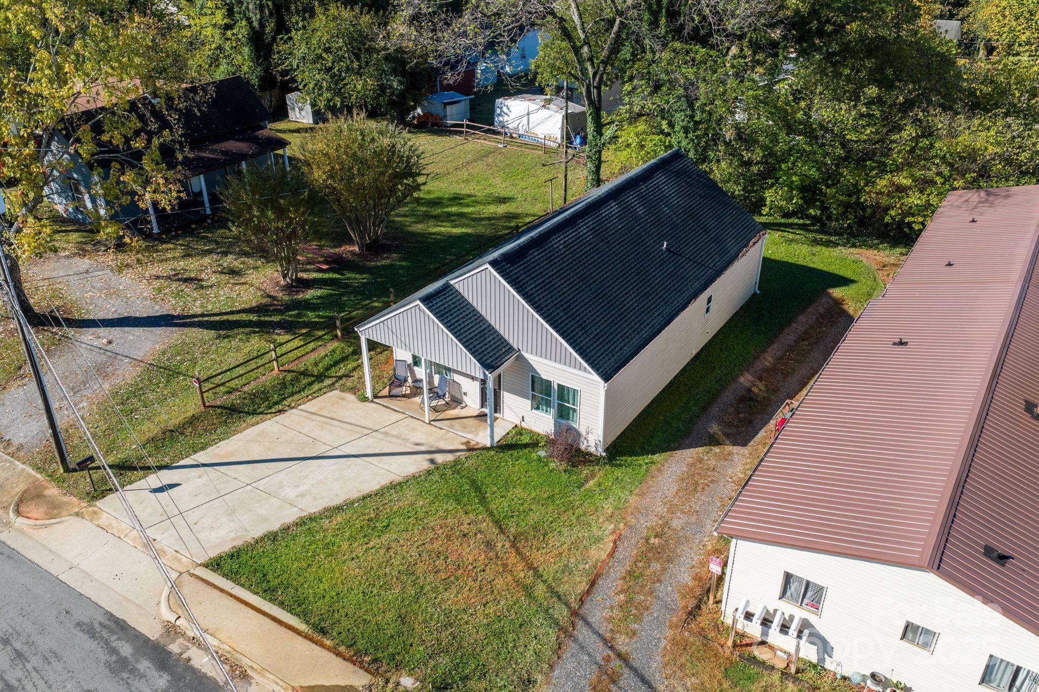 402 2nd Street Southwest Hickory, NC 28602 - Photo 22 of 24 a view of house with a yard