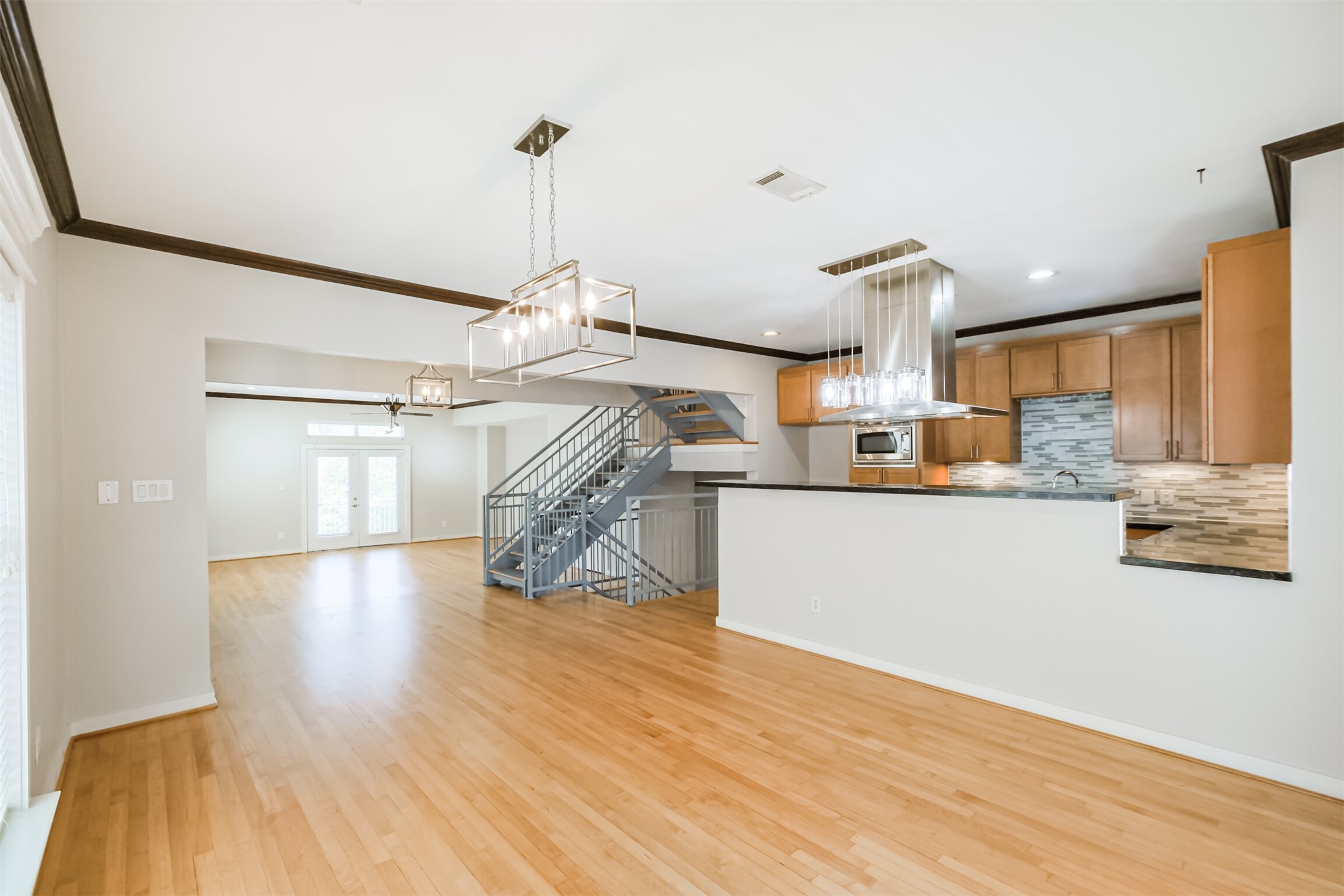2364 Arlington Street Houston, TX 77008 - Photo 18 of 45 a view of a kitchen and an empty room