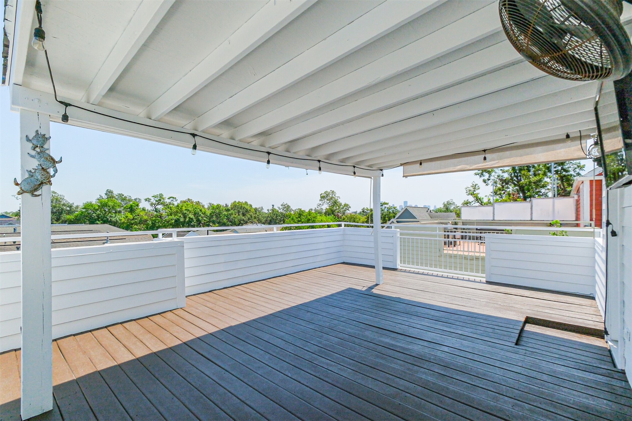 2364 Arlington Street Houston, TX 77008 - Photo 42 of 45 a room with lots of trees in front of it