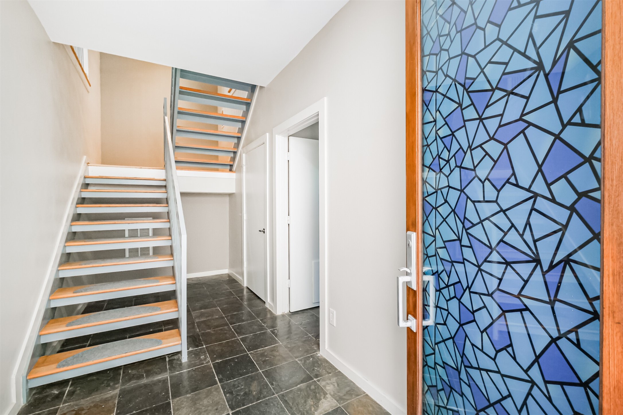 2364 Arlington Street Houston, TX 77008 - Photo 7 of 45 a view of a bathroom with a sink and a shower curtain