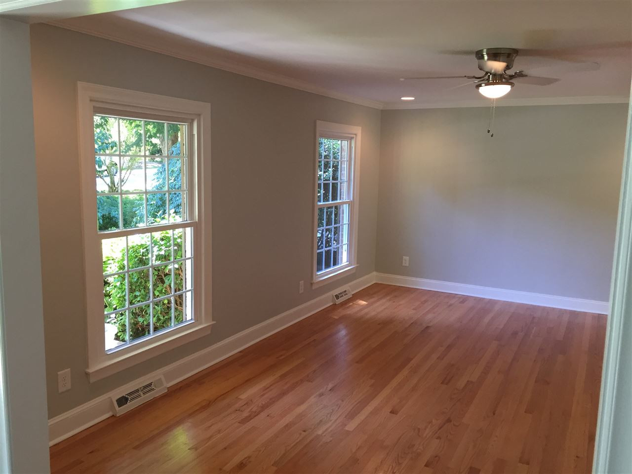 5721 Deblyn Avenue Raleigh, NC 27612 - Photo 2 of 12 Fabulous light filled living room with picture perfect hardwood floors! Living Room