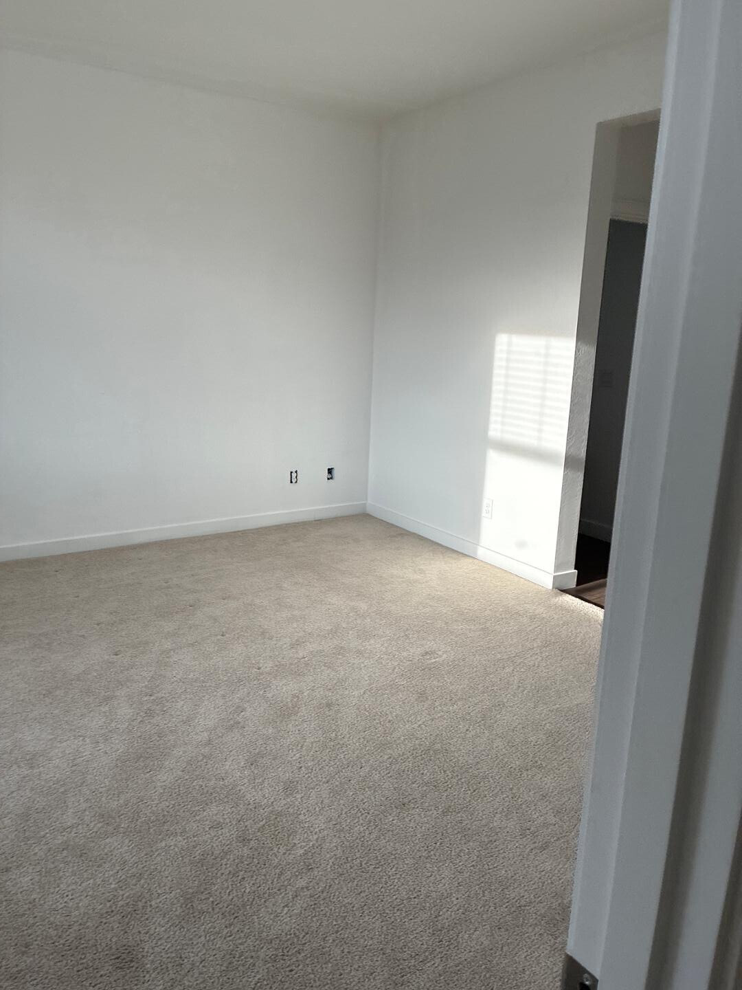 5630 South Daisy Patch Place Phoenix, AZ 85040 - Photo 11 of 14 a view of an empty room and a window