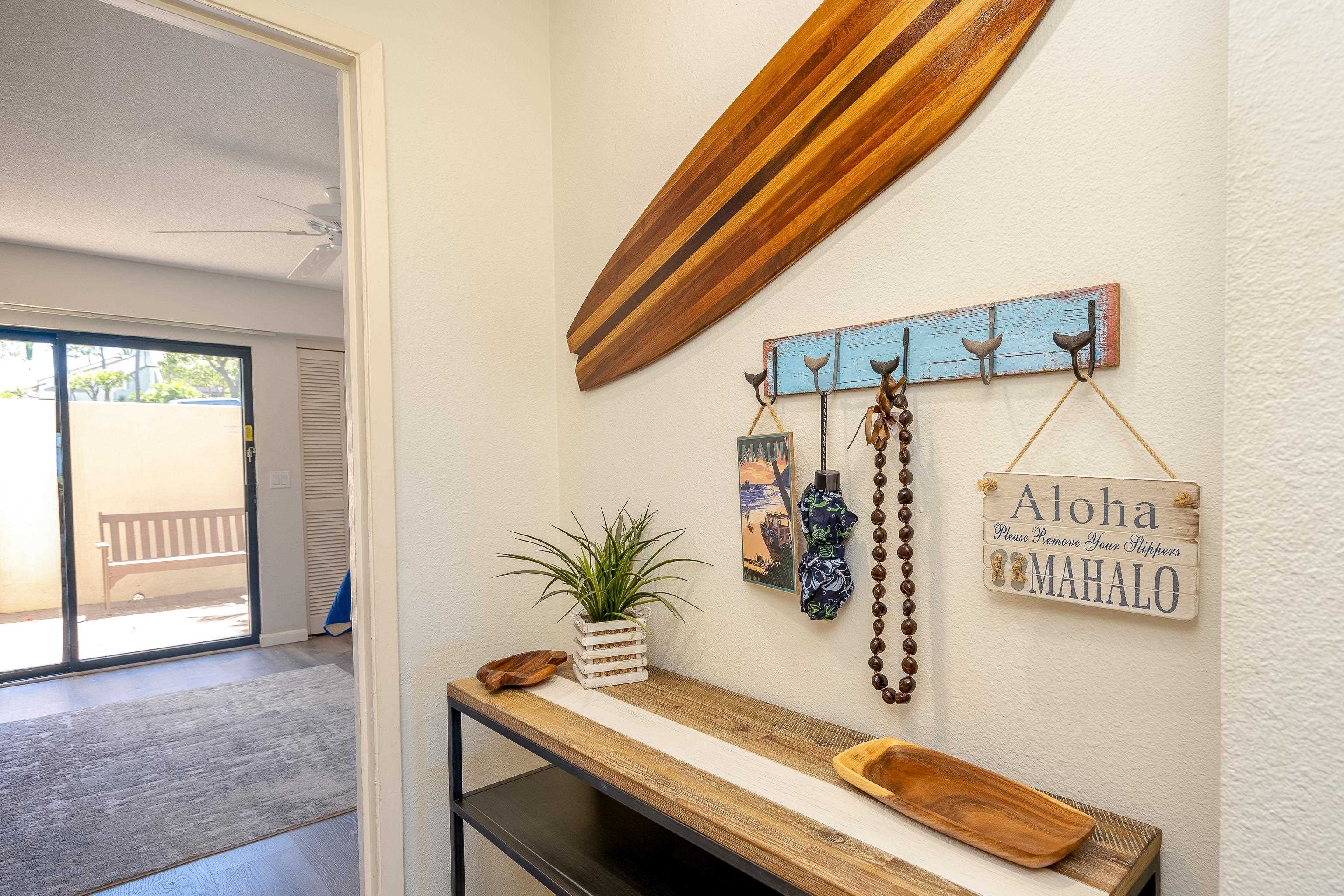 2777 South Kihei Road, Unit G101 Kihei, HI 96753 - Photo 16 of 32 a room with a table and a potted plant