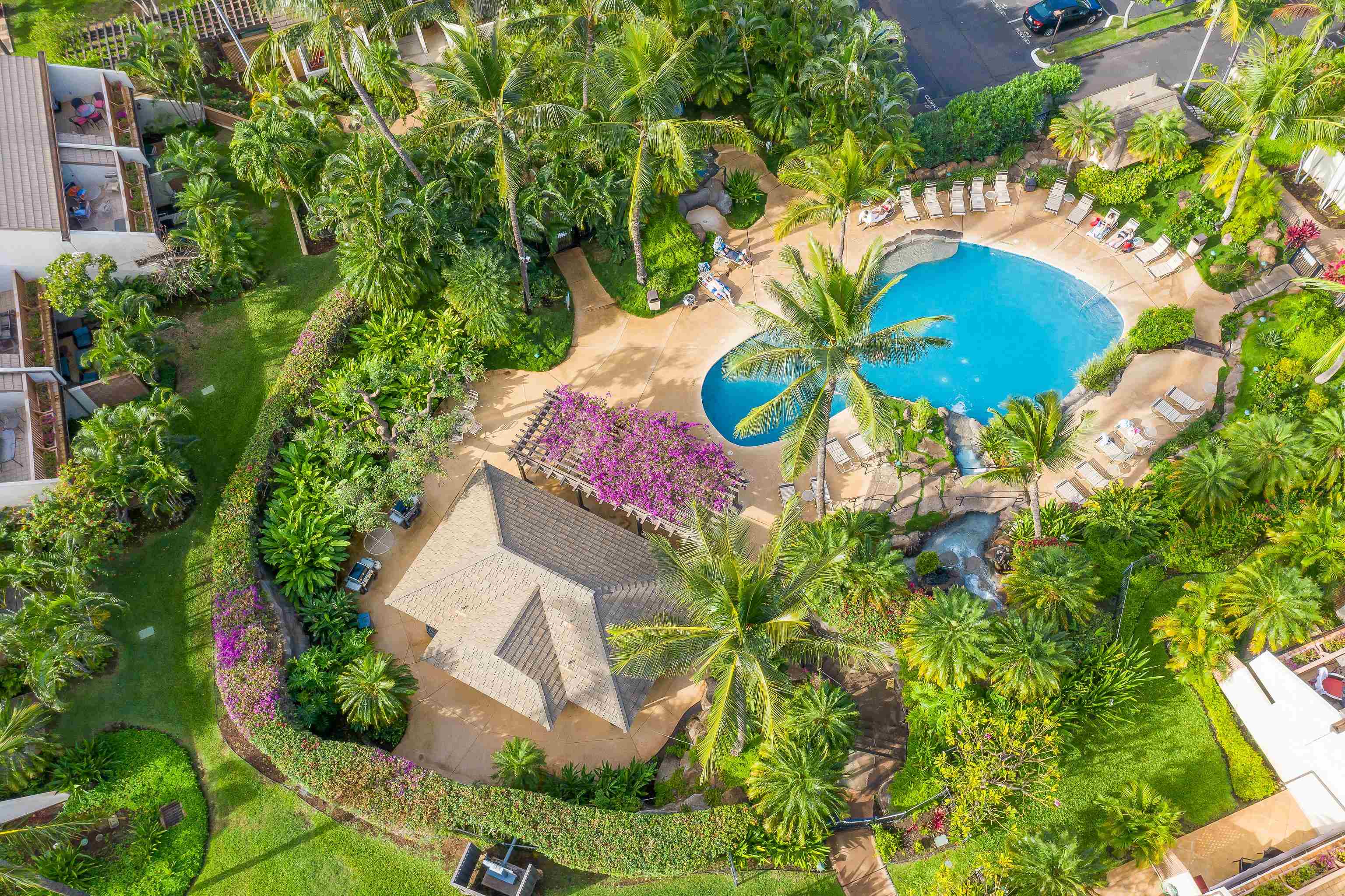 2777 South Kihei Road, Unit G101 Kihei, HI 96753 - Photo 22 of 32 an aerial view of a house with a swimming pool and garden