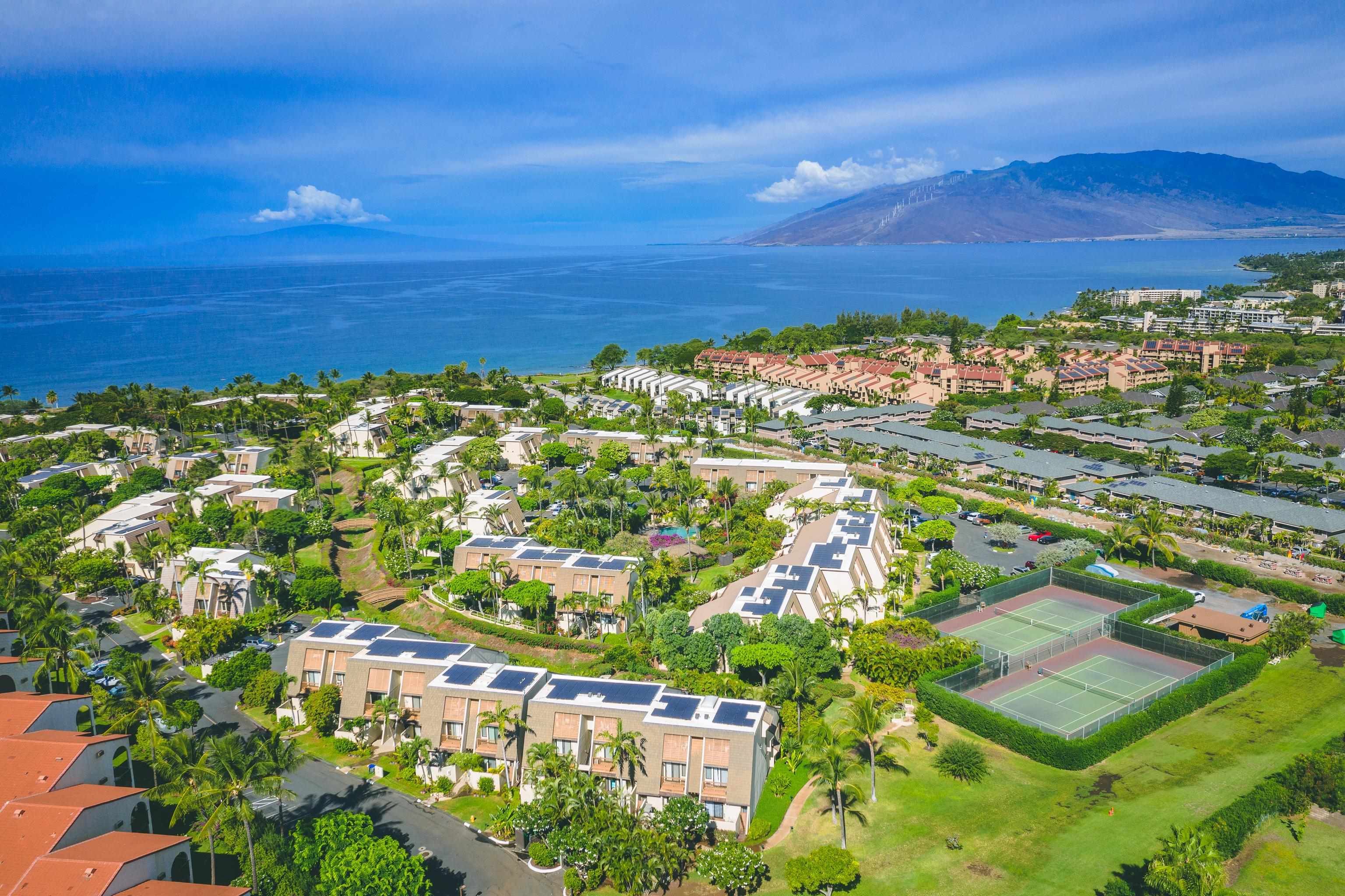 2777 South Kihei Road, Unit G101 Kihei, HI 96753 - Photo 3 of 32 a view of a city with an ocean