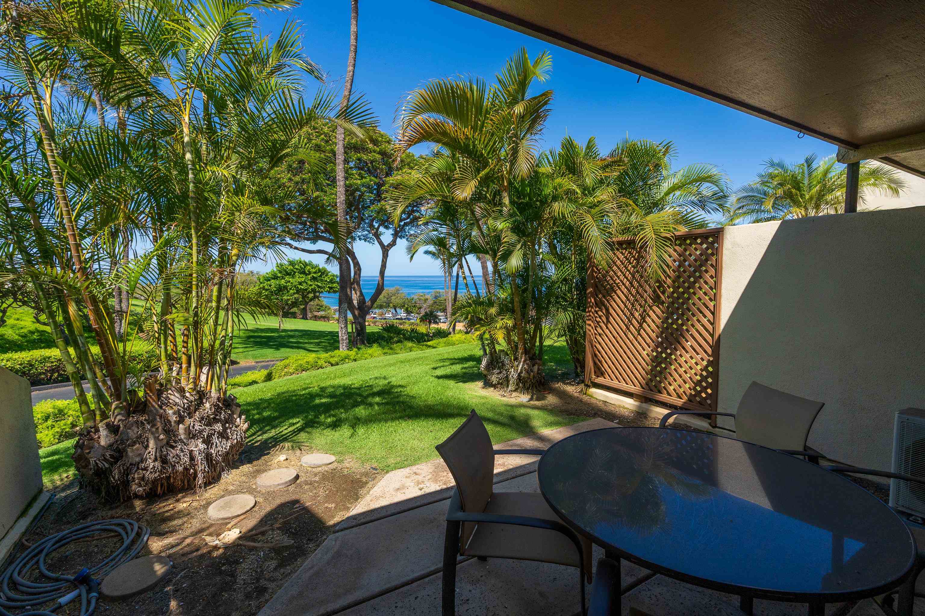 2777 South Kihei Road, Unit G101 Kihei, HI 96753 - Photo 5 of 32 a view of a backyard with a garden and furniture