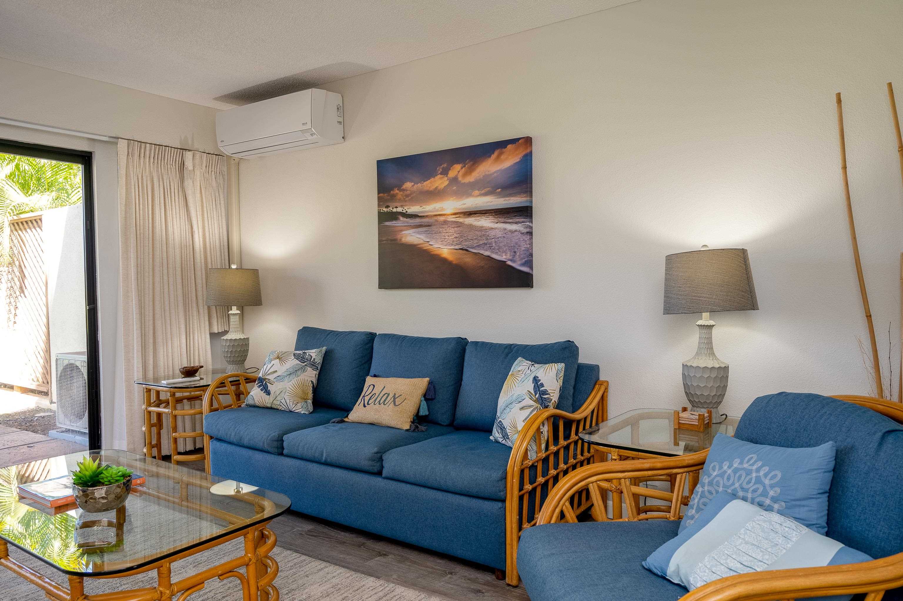 2777 South Kihei Road, Unit G101 Kihei, HI 96753 - Photo 6 of 32 a living room with furniture and a potted plant