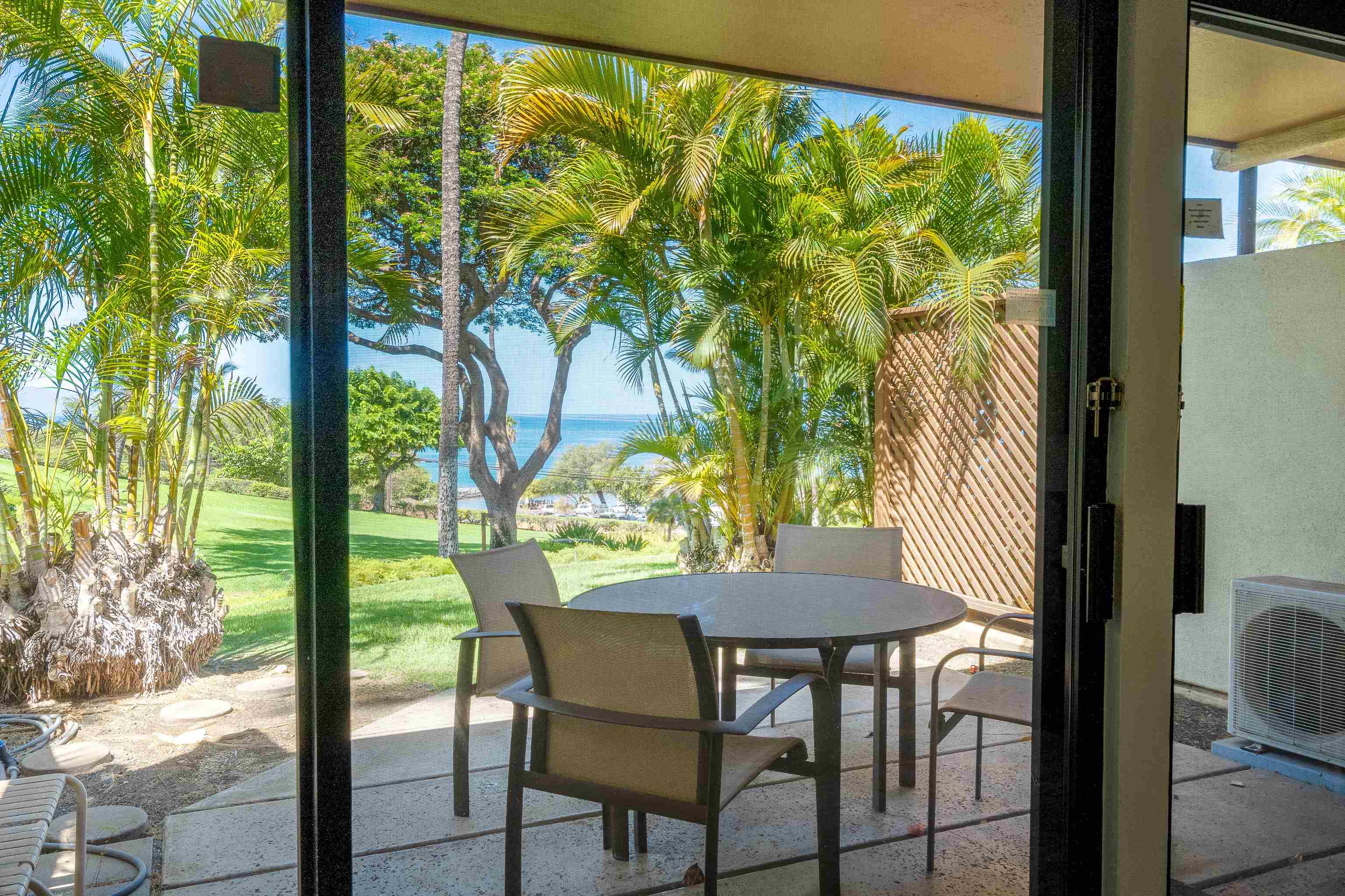 2777 South Kihei Road, Unit G101 Kihei, HI 96753 - Photo 7 of 32 a view of a porch with furniture and a yard