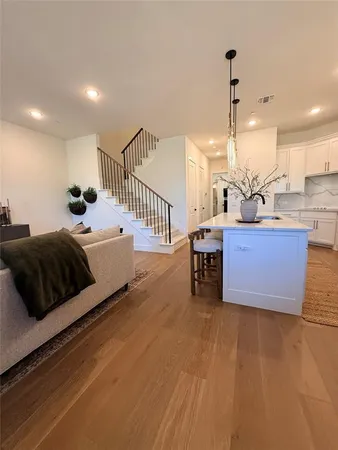 a bedroom with a bed and a view of balcony