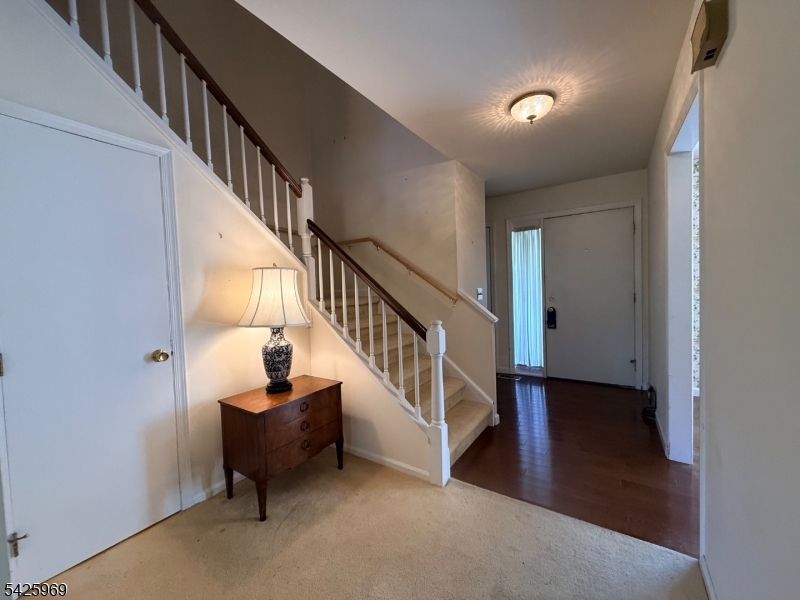 3 MacMillan Court Mahwah, NJ 07430 - Photo 13 of 48 a view of entryway and hall with wooden floor