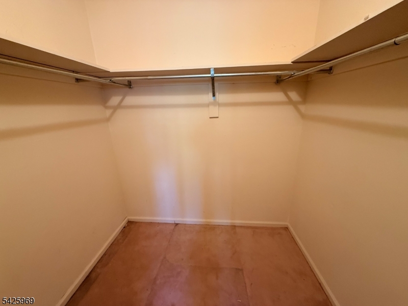 3 MacMillan Court Mahwah, NJ 07430 - Photo 20 of 48 a view of a room with racks on the wall