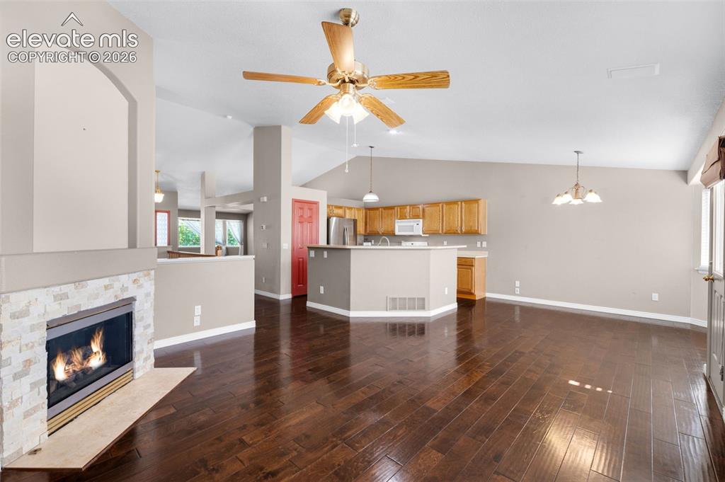 7840 Midnight Road Peyton, CO 80831 - Photo 15 of 48 Looking from family rm to kitchen - A great gathering space