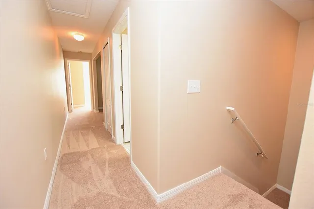 a view of a hallway with entryway