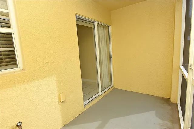 a view of a bathroom with a glass door