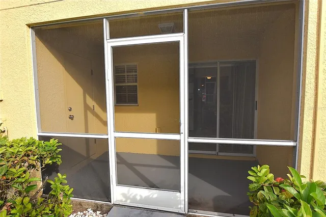 a view of a backyard of the house