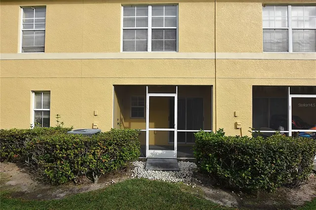 a view of a house with a swimming pool