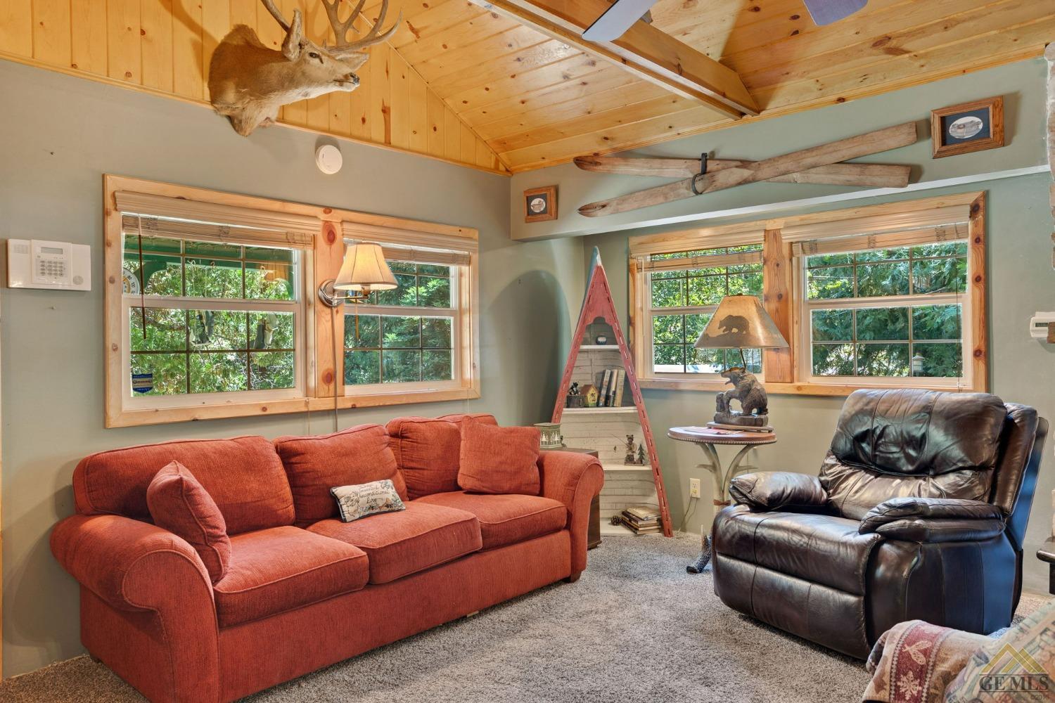 Undisclosed Address Posey, CA 93260 - Photo 12 of 50 a living room with furniture and a large window