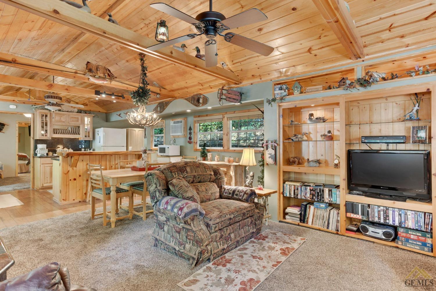 Undisclosed Address Posey, CA 93260 - Photo 13 of 50 a living room with furniture and a flat screen tv