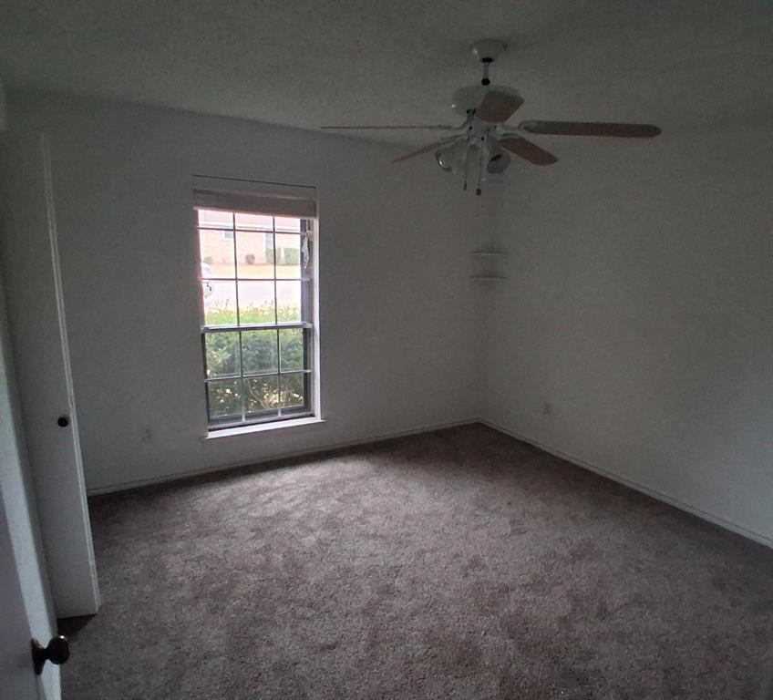 814 Oakbluff Drive Lancaster, TX 75146 - Photo 11 of 17 an empty room with a window