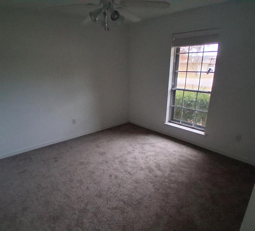 814 Oakbluff Drive Lancaster, TX 75146 - Photo 12 of 17 an empty room with a window
