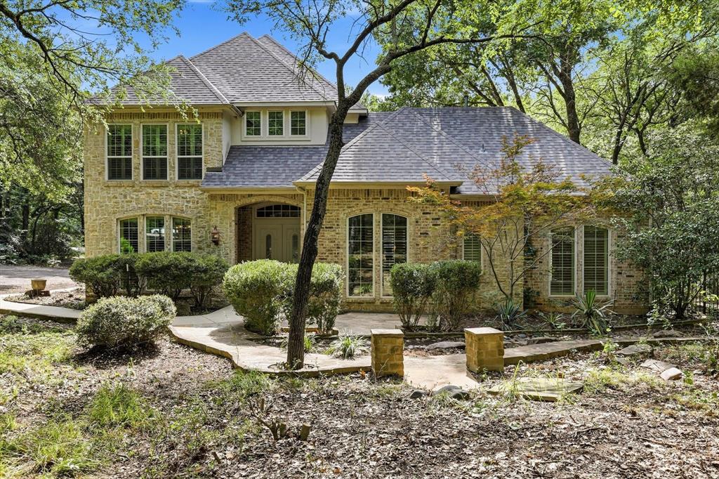 970 Crystal Cove Oak Point, TX 75068 - Photo 2 of 40 front view of a house with a yard