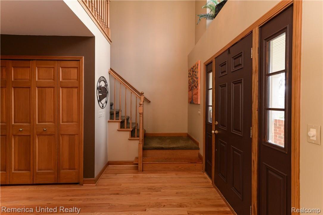 8830 South Rushton Road South Lyon, MI 48178 - Photo 25 of 48 Stairs to upper bedrooms