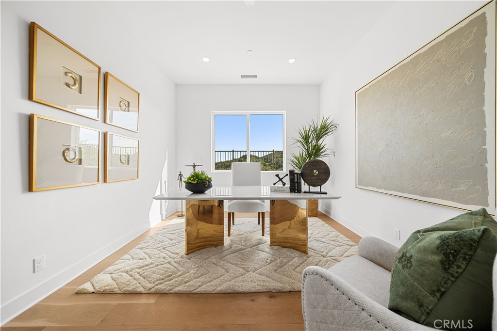 18302 Saddle Crest Silverado, CA 92676 - Photo 13 of 40 a living room with furniture and a potted plant