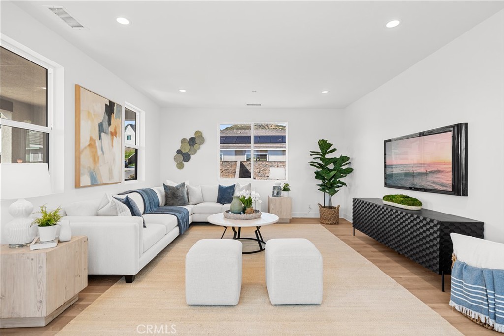 18302 Saddle Crest Silverado, CA 92676 - Photo 29 of 40 a living room with furniture and a large window