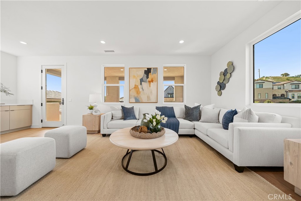 18302 Saddle Crest Silverado, CA 92676 - Photo 30 of 40 a living room with furniture and a large window