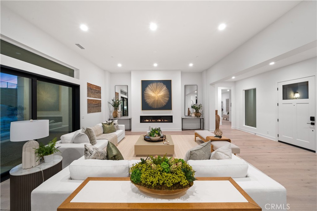 18302 Saddle Crest Silverado, CA 92676 - Photo 4 of 40 a living room with furniture and a flat screen tv