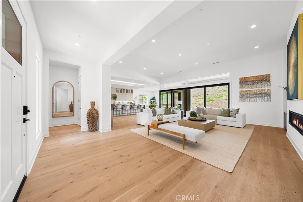 18302 Saddle Crest Silverado, CA 92676 - Photo 6 of 40 a living room with furniture and a large window