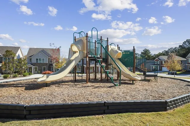 a view of a house with a park