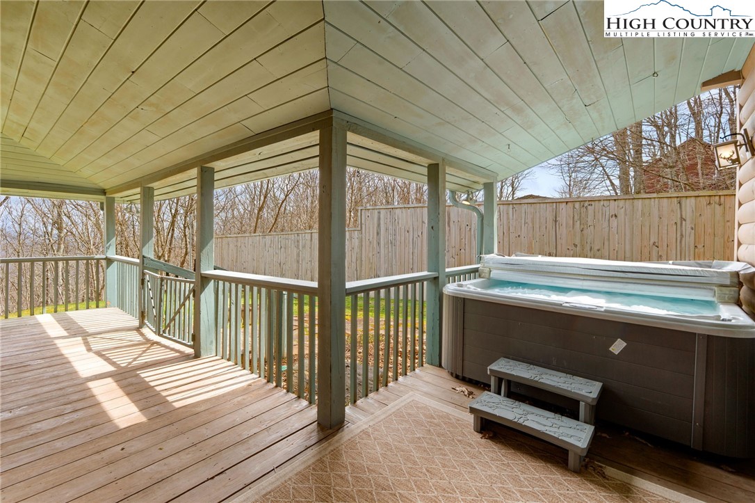 1748 Junaluska Road Boone, NC 28607 - Photo 31 of 37 a view of a balcony with wooden floor