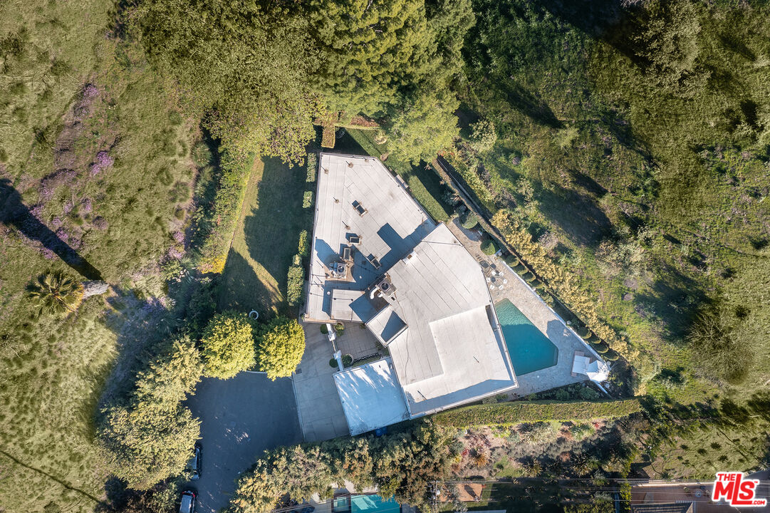 9770 San Circle Beverly Hills, CA 90210 - Photo 27 of 29 an aerial view of a house with a yard