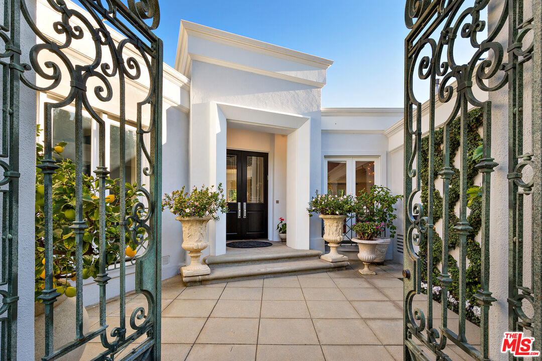 9770 San Circle Beverly Hills, CA 90210 - Photo 3 of 29 a view of a entryway door front of house