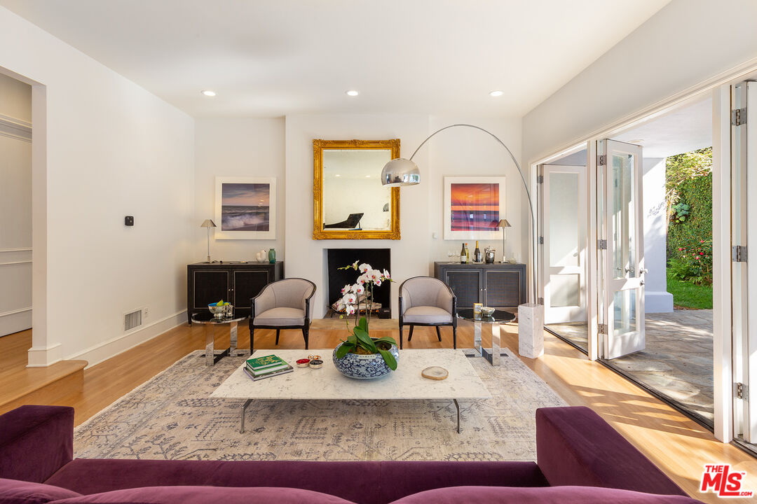 9770 San Circle Beverly Hills, CA 90210 - Photo 7 of 29 a living room with furniture