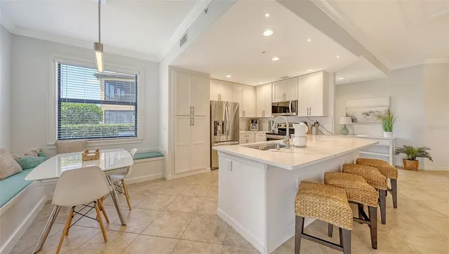 a bedroom with furniture and a flat screen tv