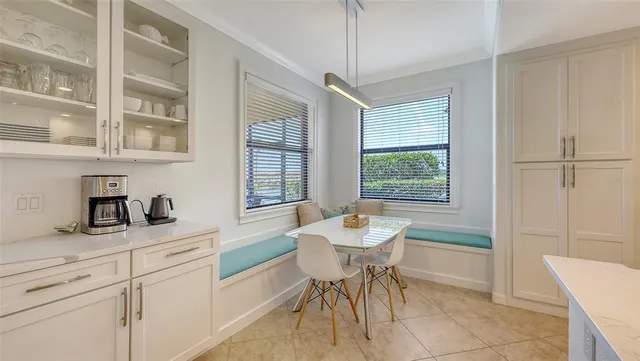 a view of room with wooden floor and windows