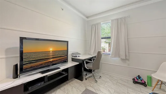 an aerial view of a swimming pool and outdoor space