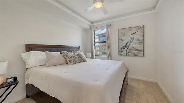 a view of a swimming pool and trees in the background