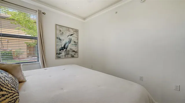 a view of a house with swimming pool and sitting area