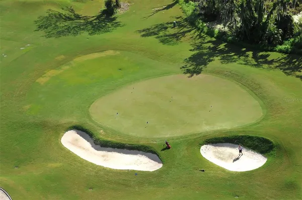 a view of an outdoor space and tennis court
