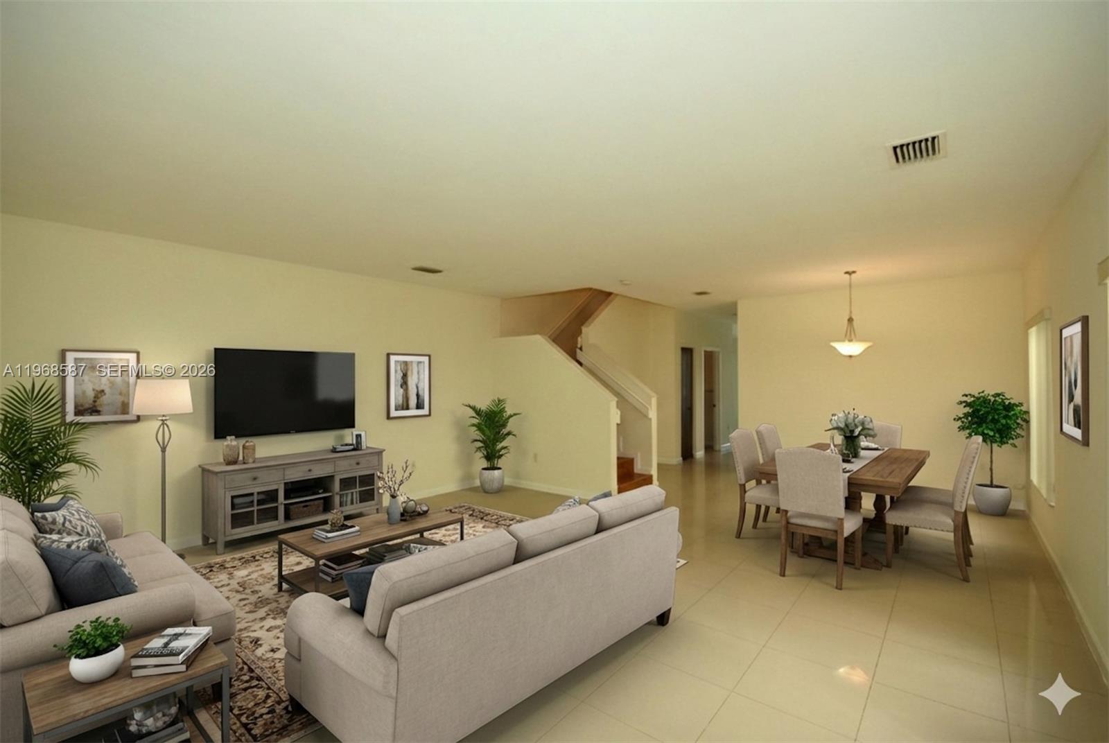 2780 Southwest 33rd Avenue Miami, FL 33133 - Photo 2 of 52 a living room with furniture and a flat screen tv