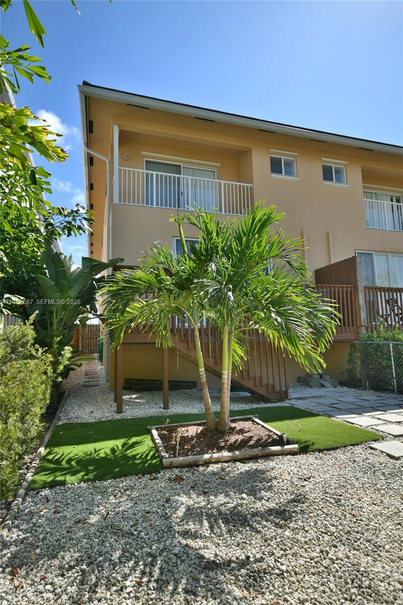 2780 Southwest 33rd Avenue Miami, FL 33133 - Photo 36 of 52 a front view of a house with garden