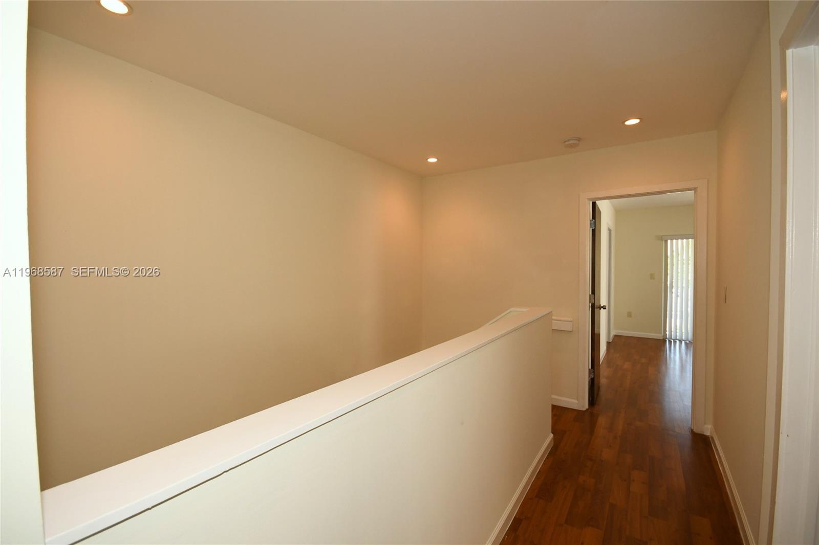 2780 Southwest 33rd Avenue Miami, FL 33133 - Photo 38 of 52 a view of a hallway with wooden floor